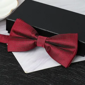 Classic wine red double layer bow tie with fine texture, elegant for formal events and weddings.