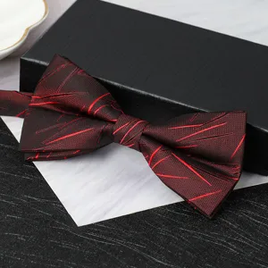 Red black patterned bow tie close up detail for formal wedding suit wear accessory