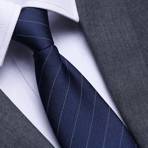 Men's business blue striped tie detail shot, professional formal wear necktie close-up.