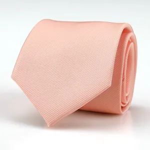 Solid pink men's business necktie with fine twill texture, classic formal wear detail shot.