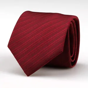 Classic red men's business tie detail, premium textured fabric for formal wedding suits.