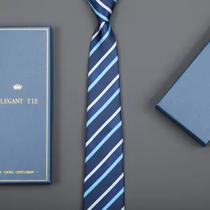 Detail view of a classic blue striped business necktie presented with an elegant gift box.