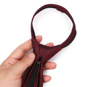Detail view of wine red patterned lazy zipper tie showing the convenient fastening mechanism.