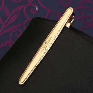 Gold tone metal tie clip with starburst engraving detail for men business formal suit accessory.