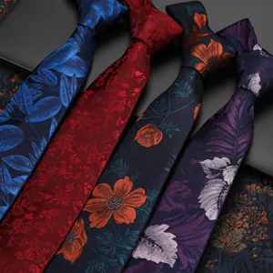 Vintage floral tie set detail shot, elegant fabric texture and colorful botanical patterns.