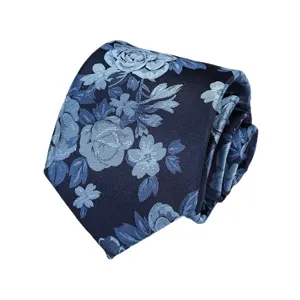 Retro dark blue floral woven tie, detailed close-up shot showing exquisite fabric texture.