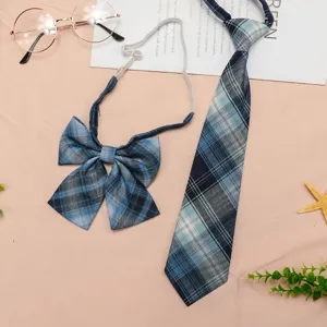 Detail shot of blue plaid JK uniform tie and bow set, perfectly matched accessory details.