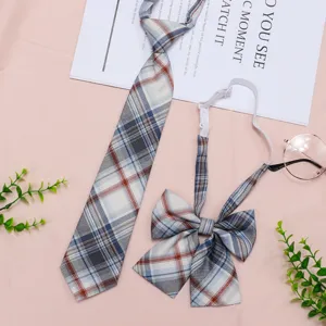 Detailed shot of JK uniform plaid tie and bow tie set, pre-tied design for easy daily wear.