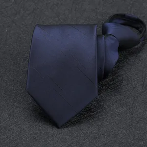 Detail view of the navy blue zipper tie with subtle diagonal stripes for men business suit.