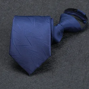 Blue zipper necktie close-up view, showing detailed fabric texture and abstract pattern design.