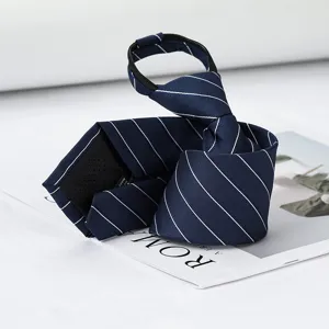 Detailed close-up of a classic navy blue necktie featuring crisp white diagonal stripes.