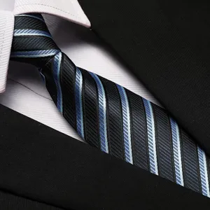 Detailed shot of a blue and black striped business necktie with a crisp white shirt.