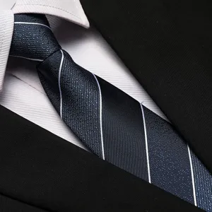 Detail shot of dark blue striped business tie fabric close up professional formal wear.