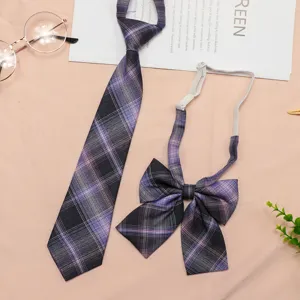 Detailed view of purple plaid pre-tied tie and bow set, perfect for JK uniform accessories.