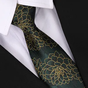 Close-up detail of dark green retro floral necktie with golden pattern for formal suits.