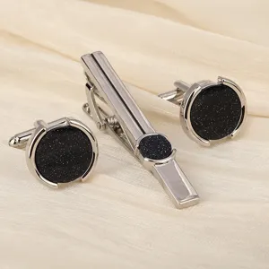 Ensemble pince à cravate et boutons de manchette homme argentés en pierre de sable bleu.