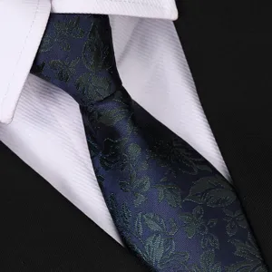 Close-up detail of dark blue floral necktie for business wear. Stylish retro design for men.