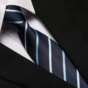 Close-up detail of the classic navy blue striped business necktie for men and women formal wear.