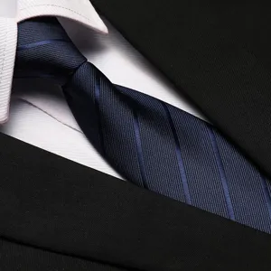 Detailed view of professional blue striped business necktie matching formal suit jacket.