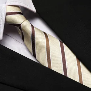 Detail shot of a classic striped business tie in beige and brown, perfect for professional wear.
