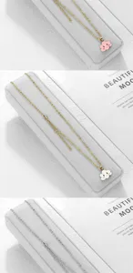 Cute cartoon cloud pendant necklace with gold and silver chains, sweet smiling face design.