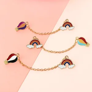 Gold alloy rainbow cloud and hot air balloon double charm linking chain brooch set main view.