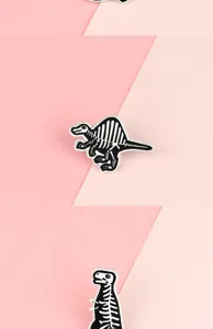 Black and white dinosaur skeleton enamel pin alloy brooch creative badge for clothing backpacks.