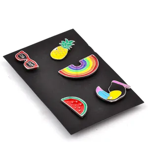 Cute summer fruit animal enamel pin set featuring pineapple rainbow and toucan designs.