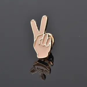 Gold tone alloy peace sign lapel pin with enamel fill, cute fashion brooch badge accessory.