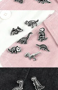 Black and white alloy dinosaur skeleton enamel pins, creative fossil badge brooch set.