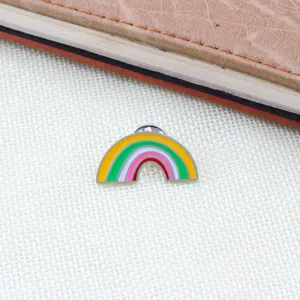 Detailed close-up shot of the colorful rainbow enamel lapel pin, showcasing vibrant metal oil-drop craft.