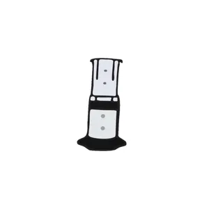 Detailed close-up of a stylish coffee maker shaped enamel pin badge, perfect accessory.
