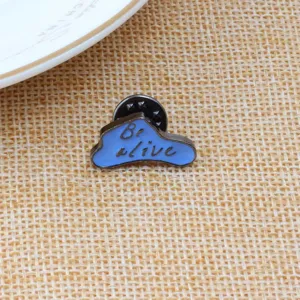 Cloud enamel lapel pin detail shot showing blue cloud design and metallic texture clearly.