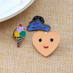 Cute enamel pin set featuring ice cream, cloud, and smiley heart designs for fashion decor.