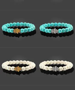 Bracelet de perles de turquoise avec pendentif main de hamsa en alliage yoga stretch