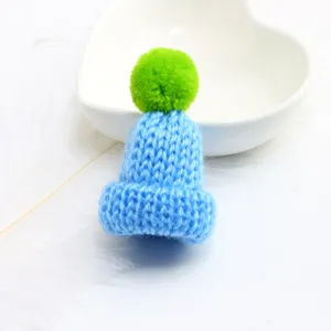 Cute blue knitted hat brooch with green pom-pom, sweet mini wool cap accessory for bags.