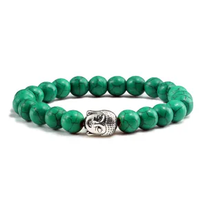 Groene turquoise kralen armband met zilveren Boeddha hoofd bedel, elastische stenen armband.