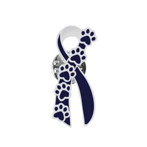 Detailed close-up of cute paw print ribbon lapel pin, showing exquisite alloy craft.