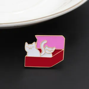 Cute cat enamel pin detail shot, alloy brooch with pink box design, fashion accessory.