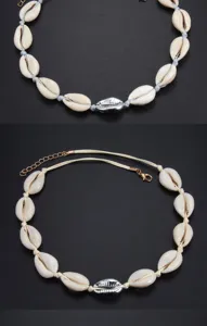 Nahaufnahme des böhmischen Kauri-Muschel-Choker-Halsbands mit glänzendem mittlerem Muschel-Anhänger.