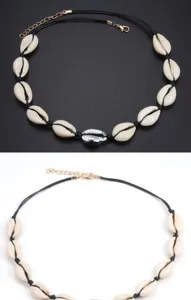 Nahaufnahme Detail der hawaiianischen Muschel Kette Choker mit schwarzem Kordel und Verschluss.