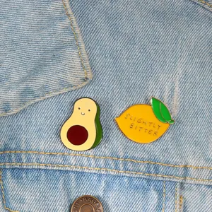 Cute cartoon avocado and lemon enamel pins set, metal alloy brooches for denim and bags.