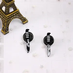 Punk style alloy dagger lapel pin, black and white gothic brooch badge for men and women.