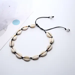 Collana girocollo con conchiglie di mare naturali fatta a mano stile boho cordino nero