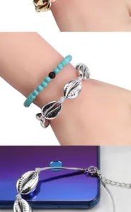 Handgefertigtes Muschel geflochtenes Armband mit Türkis Perlen Sommer Strand Mode Schmuck.