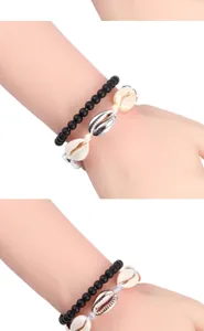 Set di bracciali con conchiglie e perline, gioiello da spiaggia stile bohémien hawaiano.
