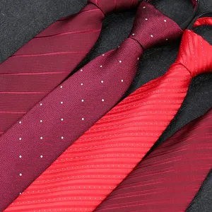 Red zipper necktie detail close up, silk texture men wedding formal business neck wear.