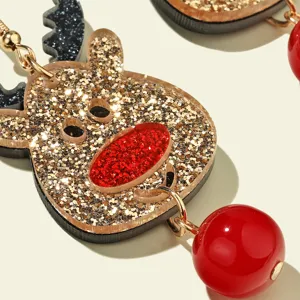 Christmas reindeer acrylic earrings detail shot, cute glitter holiday jewelry gift.