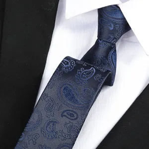 Classic blue paisley necktie for men, elegant formal business suit accessory detail view.