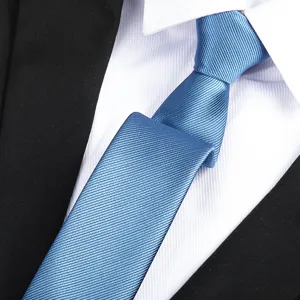 Blue textured tie detail shot, professional business formal necktie close-up texture.